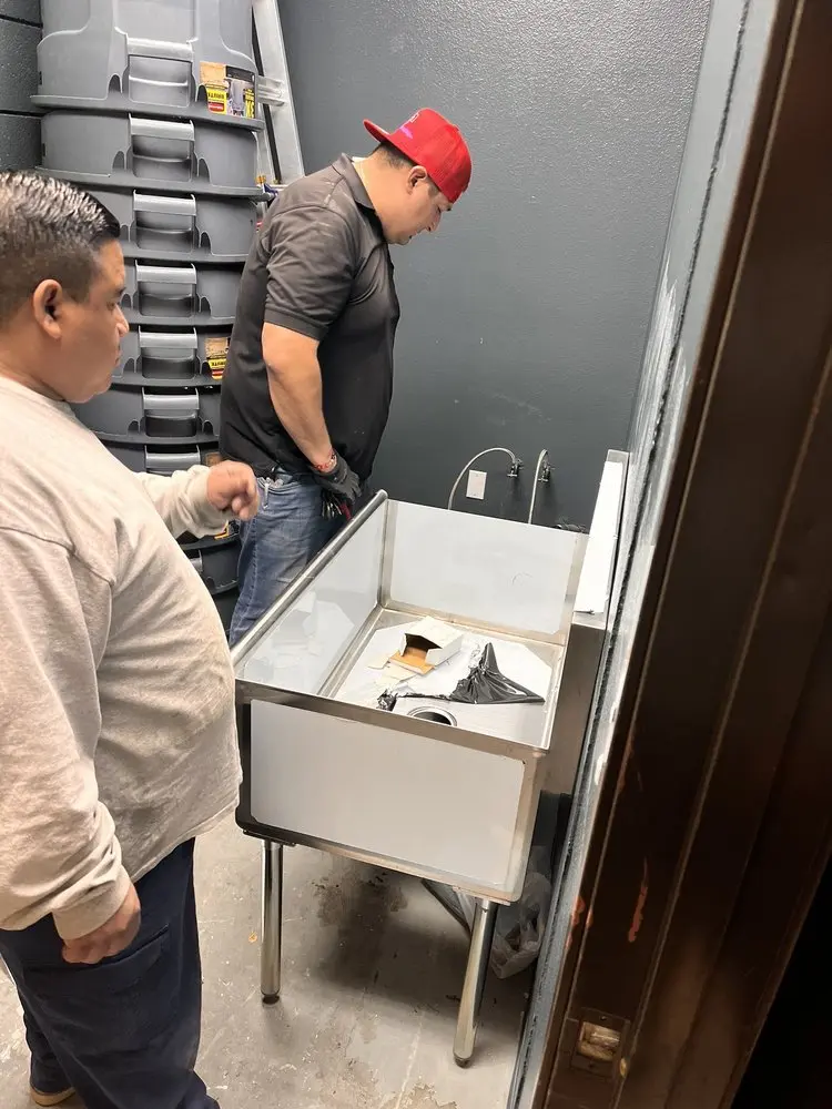Commercial plumbing and sink installation in Peru